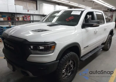 2020 Ram 1500 Rebel 4X4 5'7 Box from USA, damaged, VIN 1C6SRFLT5LN285591